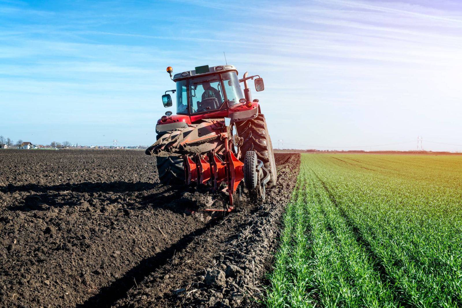 Tractor plowing a field