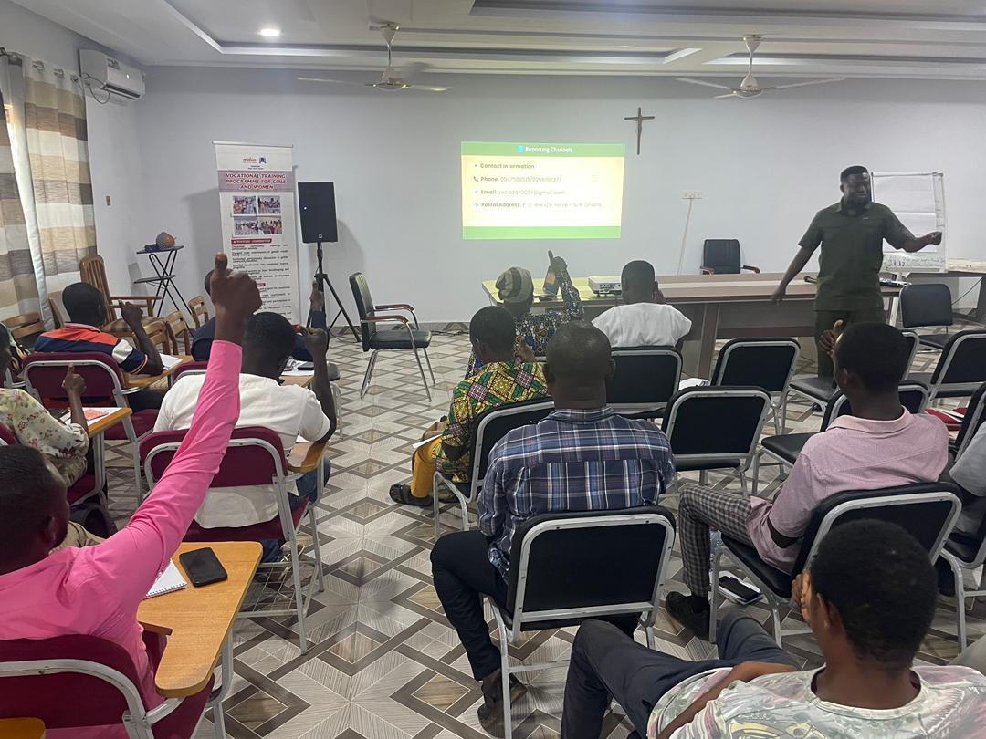 Vocational training programme session with reporting channels slide