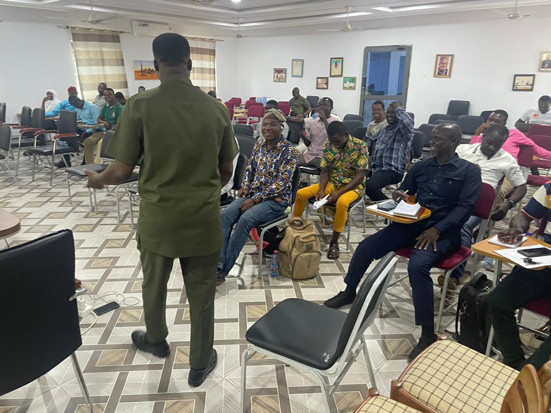 Facilitator engaging seated workshop participants